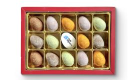 Gift box filled with solid Easter eggs